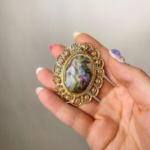 Vintage Victorian style courting scene brooch